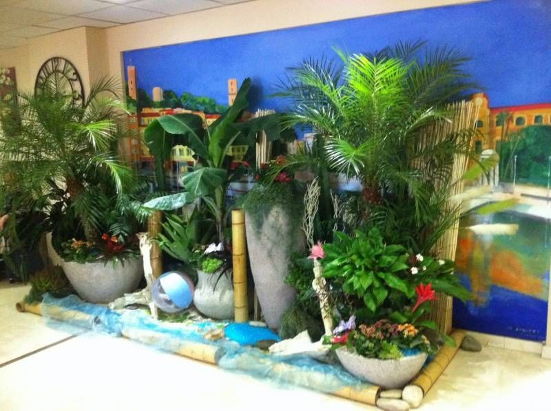 location de décor d'été floral par abonnement pour entrée de magasin, hotel restaurant de Cannes à Marseille